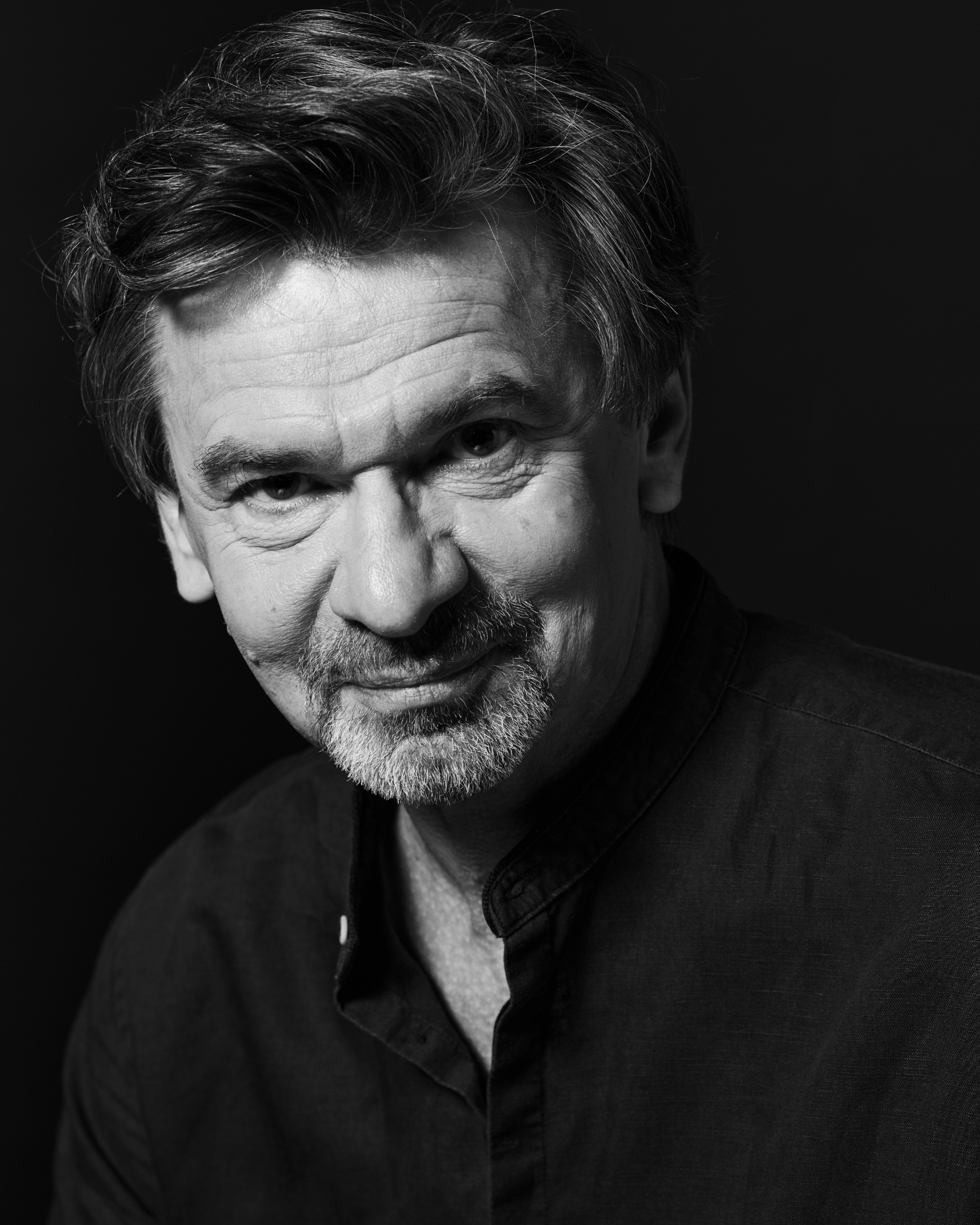Jacek Łuczak - zdjęcie portretowe aktora Teatru Kwadrat